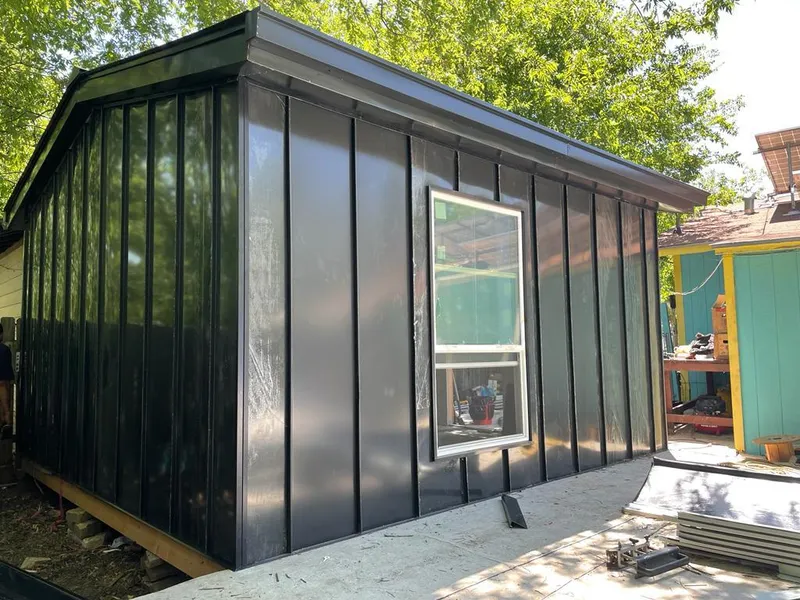 Black standing seam metal wall panels for Metal Roof Installation in Woodstock